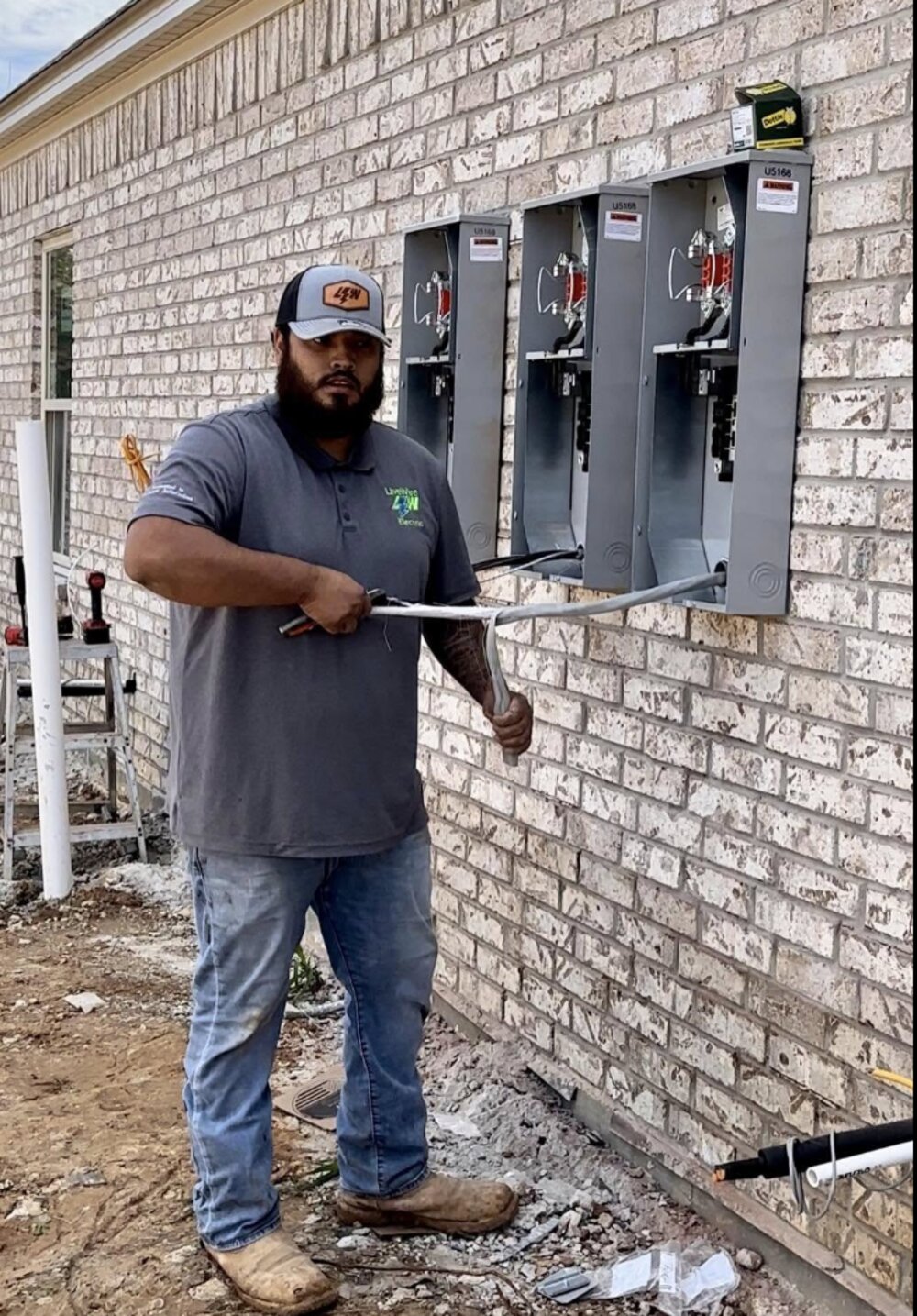 LiveWire electrician on an exterior service job